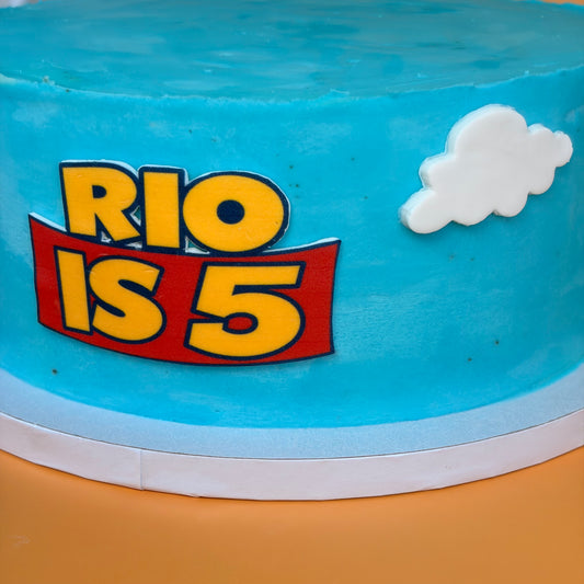 Toy Story-Themed Birthday Cake with Custom Name Banner