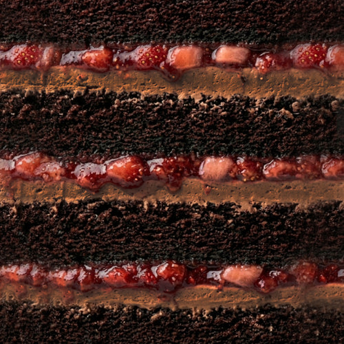 Slice of chocolate and strawberry confit cake