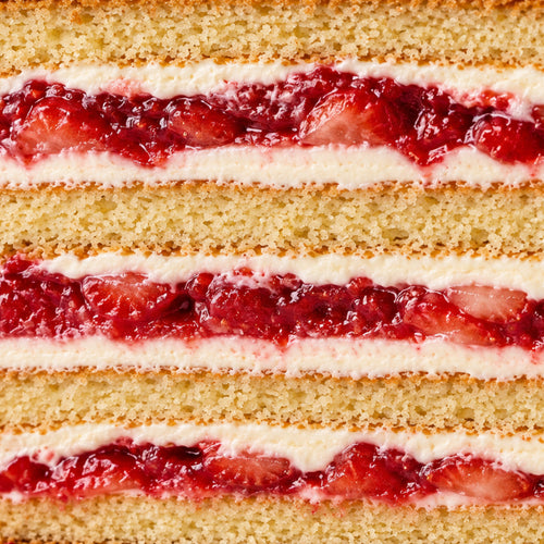 Slice of cream cheese and strawberry confit cake