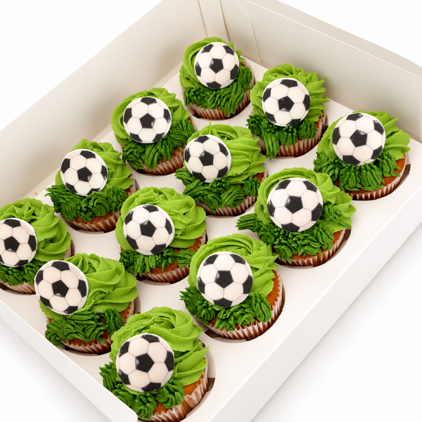Soccer cupcakes with edible toppers by The Layer Cakes