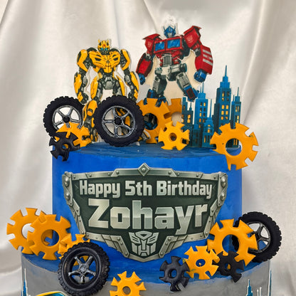 Transformers-Themed Two-Tier Birthday Cake with Custom Name Plaque
