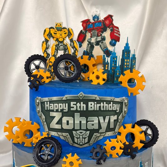 Transformers-Themed Two-Tier Birthday Cake with Custom Name Plaque