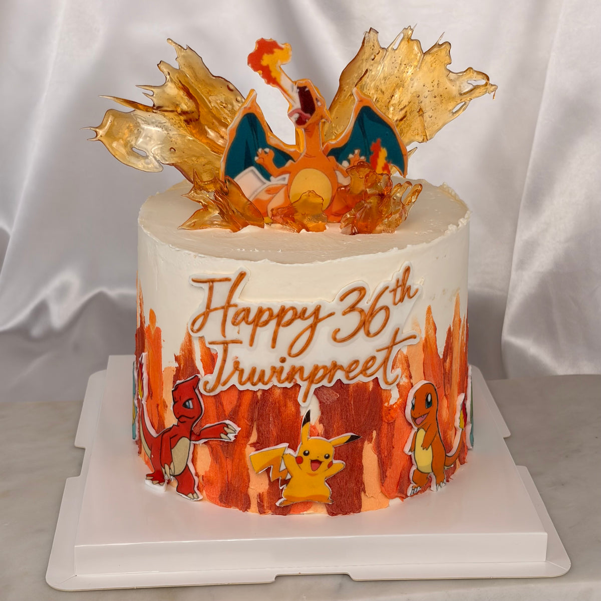 Pokémon-Themed Birthday Cake with Edible Caramel Fire