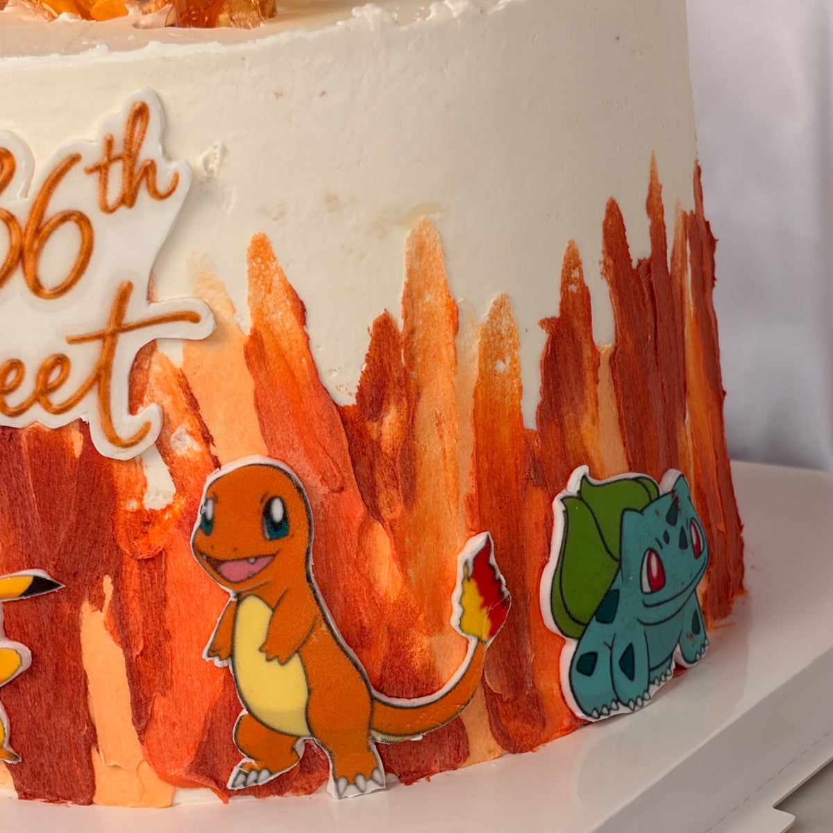 Pokémon-Themed Birthday Cake with Edible Caramel Fire