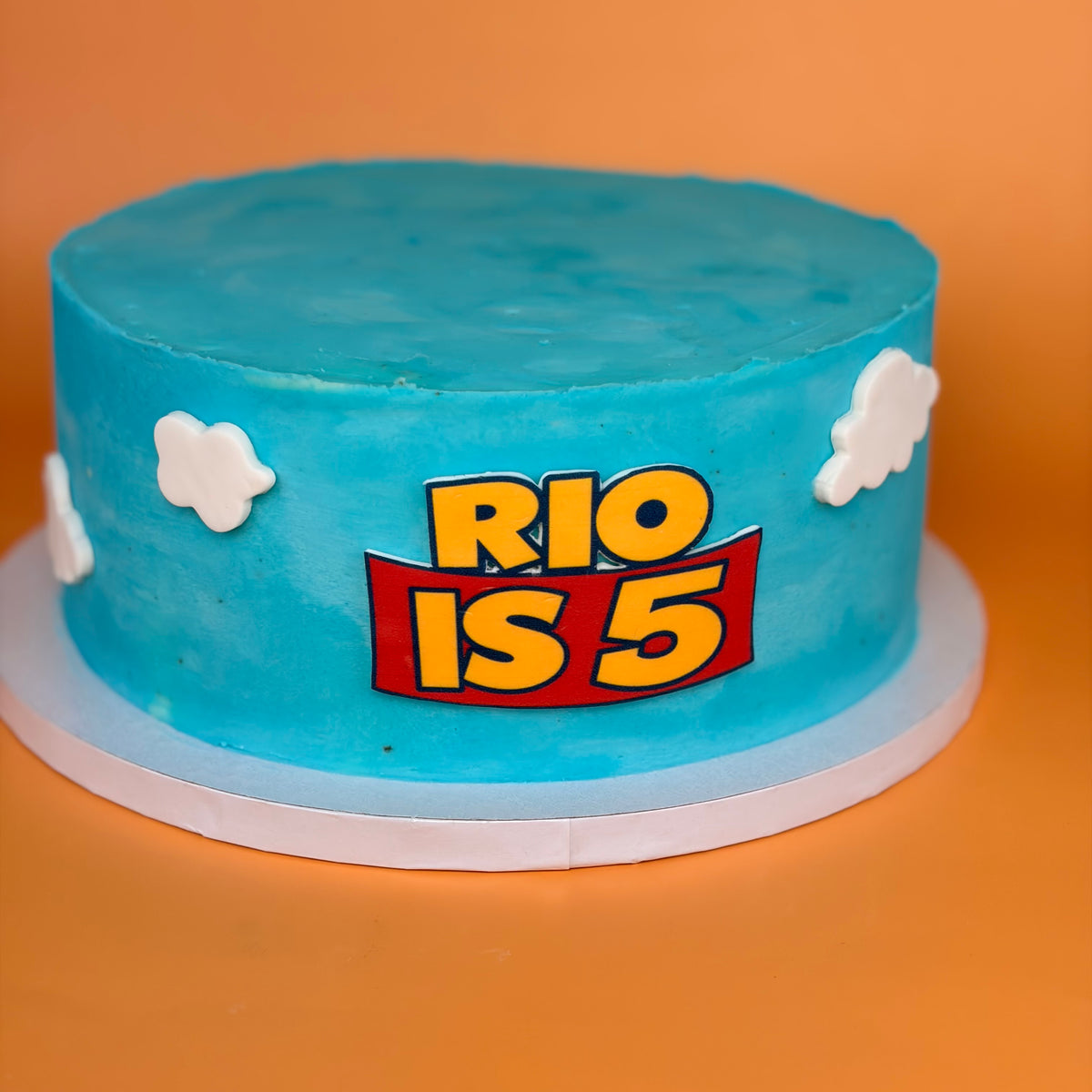 Toy Story-Themed Birthday Cake with Custom Name Banner