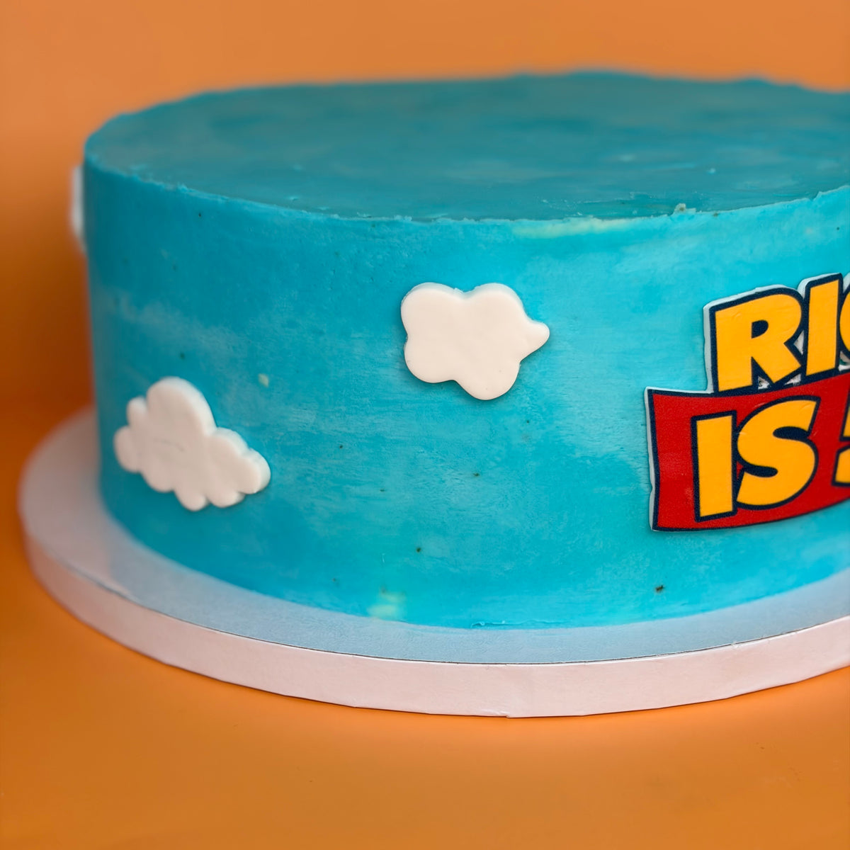 Toy Story-Themed Birthday Cake with Custom Name Banner